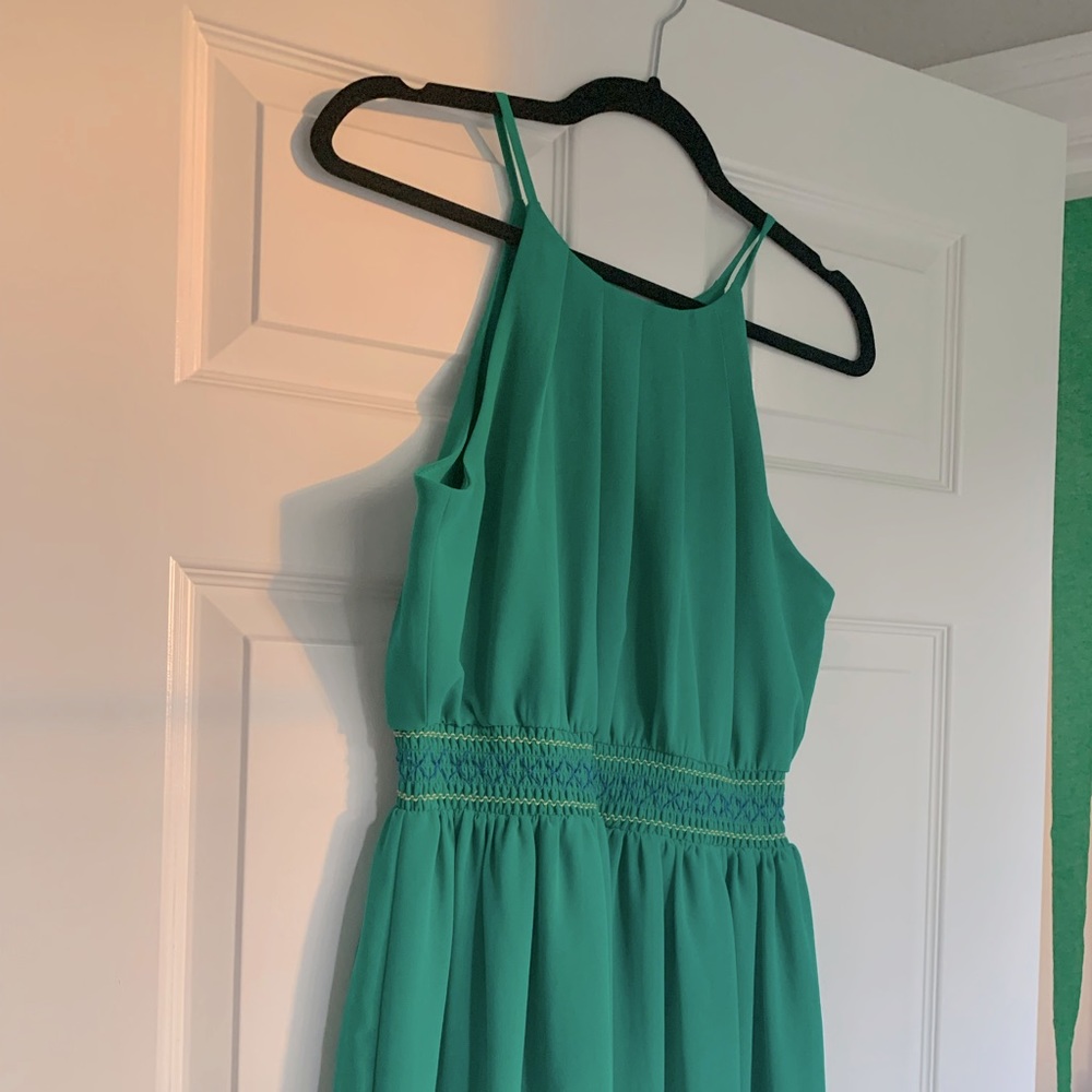 emerald green dress with navy blue and yellow stitched waist